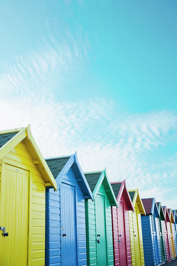 Colourful Beach Huts Along The Seafront Photograph by Andrew Bret Wallis