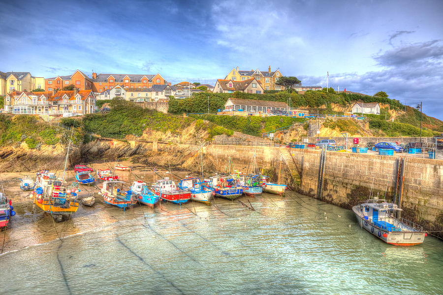 Colourful boats and clear sea Newquay harbour North Cornwall England UK ...