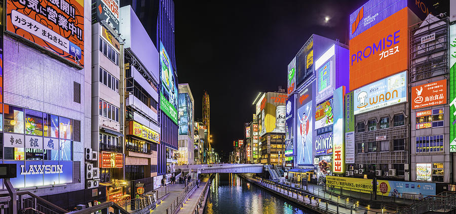 Colourful neon billboards illuminating iconic Dotonbori canal panorama Osaka Japan Photograph by fotoVoyager