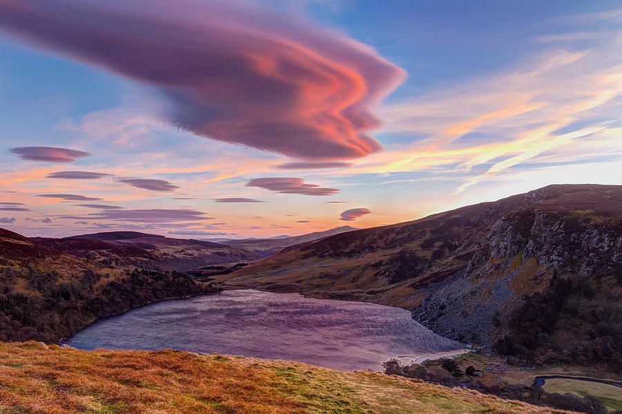 Colourful sunset over Lough Tay in Wicklow Photograph by Semmick Photo