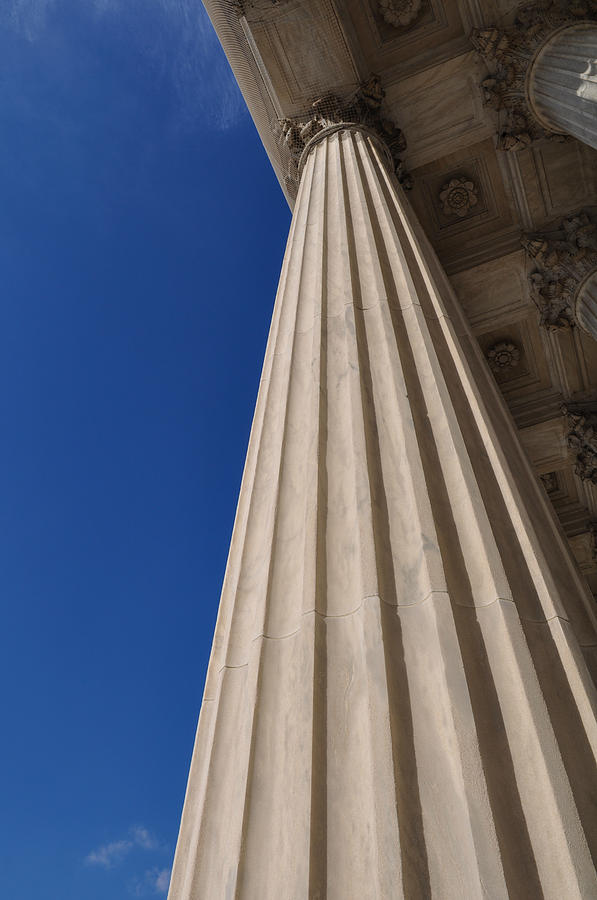 Columns at the United States Supreme Court in Washington DC Photograph by Brandon Bourdages
