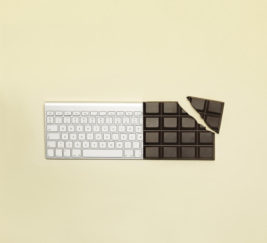 Combination of a bar of chocolate and a keyboard Photograph by Henrik Sorensen