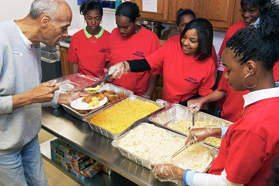 City Photograph - Community Volunteers Serve Food by Jim West