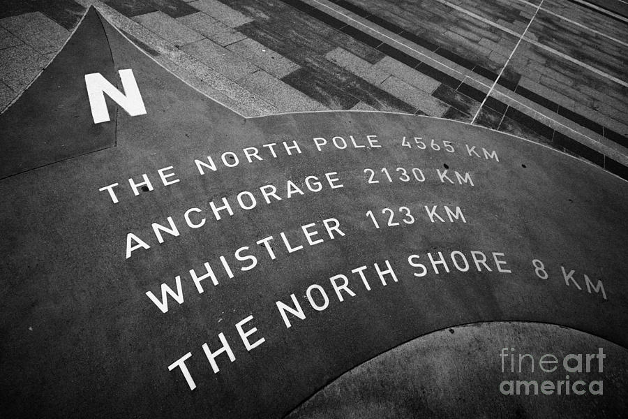 compass direction north from canada place pointing to north pole Vancouver BC Canada Photograph