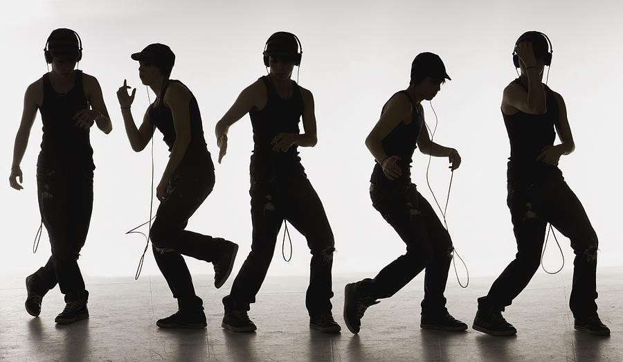 Music Photograph - Composite Image Of A Boy Dancing With by Darren Greenwood