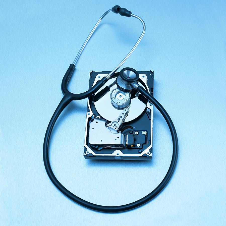 Nobody Photograph - Computer Hard Drive And Stethoscope by Science Photo Library