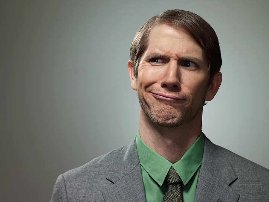 Confused mid adult businessman, portrait Photograph by Image Source