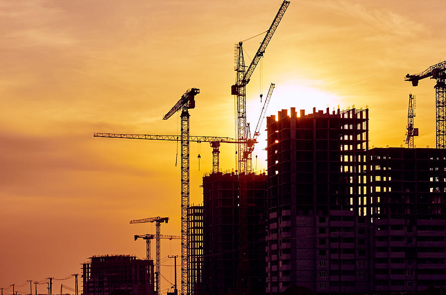 Construction site crane at dusk crane Photograph by Vladimirovic