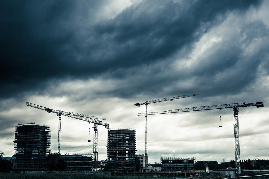 Construction Site with Cranes and Cloudy Sky Photograph by Zodebala