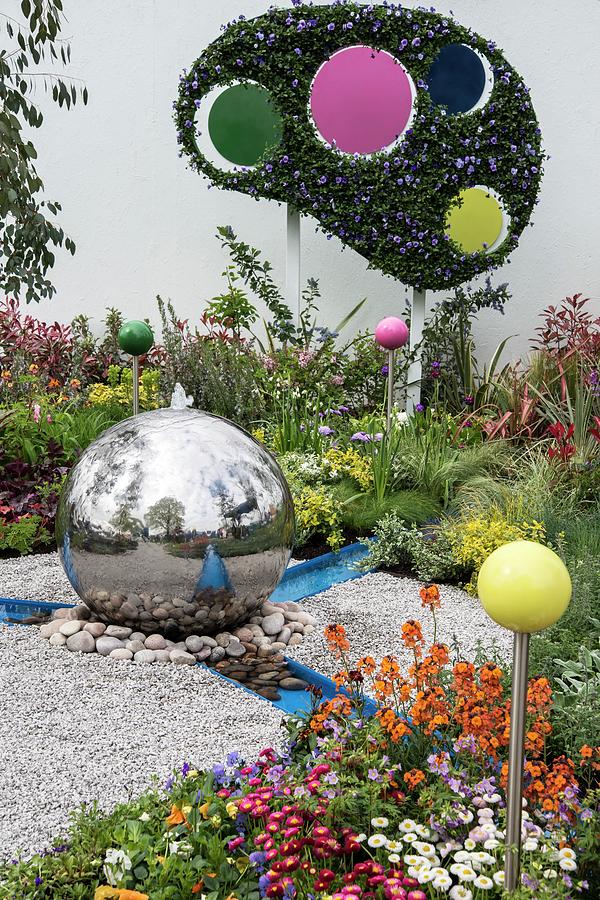 Spring Photograph - Contemporary Show Garden With Spherical Water Feature by Adrian Thomas/science Photo Library