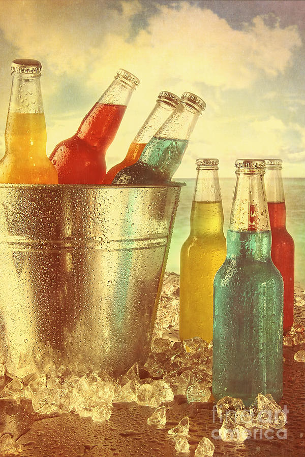 Cool drinks in ice bucket at the beach with vintage look Photograph by Sandra Cunningham