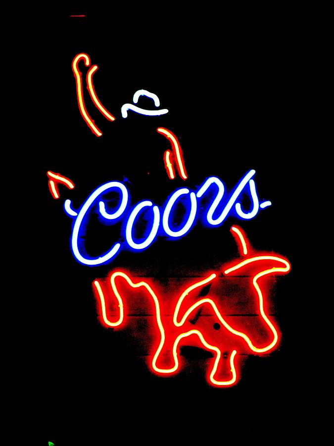 Coors bull rider arm up Photograph by Steven Parker