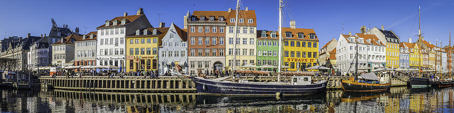 Copenhagen crowded Nyhavn colorful bars restaurants panorama beside harbour Denmark Photograph by fotoVoyager