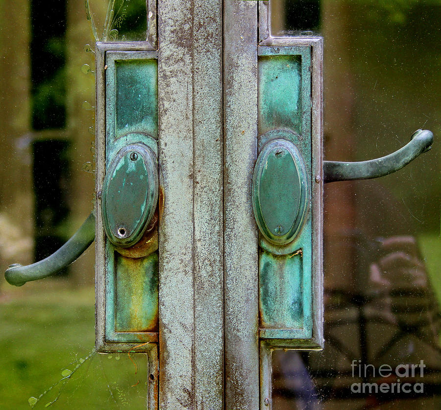 Copper Doorknobs Photograph