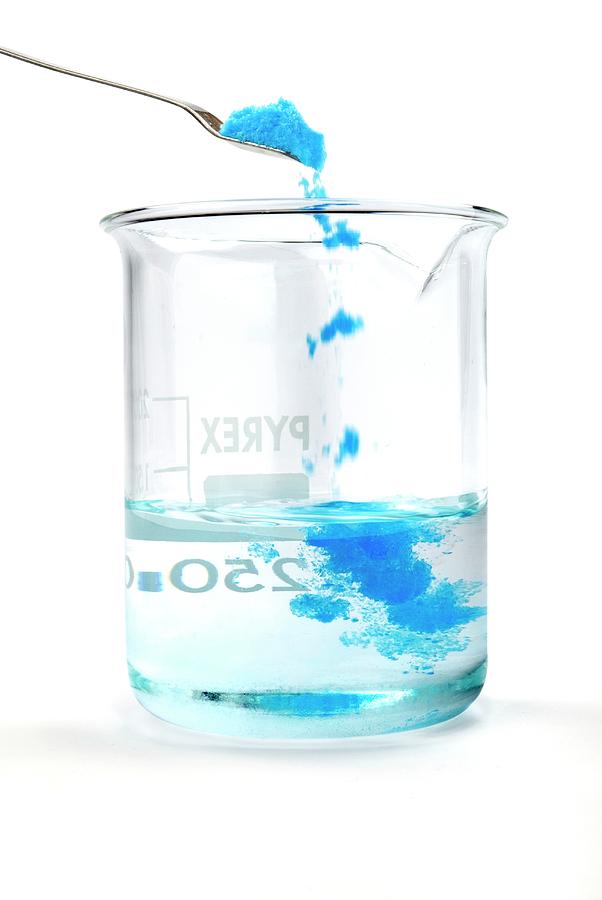 Copper Sulphate Dissolving In Water Photograph by Trevor Clifford Photography