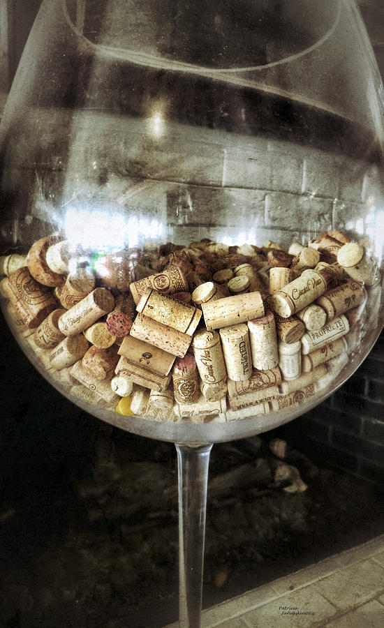 Corks in Wine Glass Photograph by Patricia Januszkiewicz