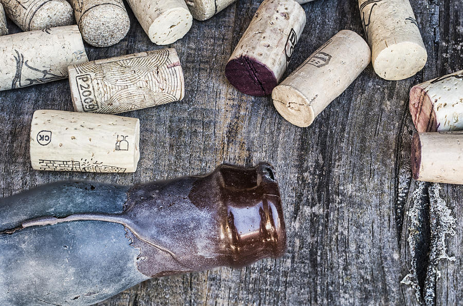 Corks with bottle Photograph by Paulo Goncalves