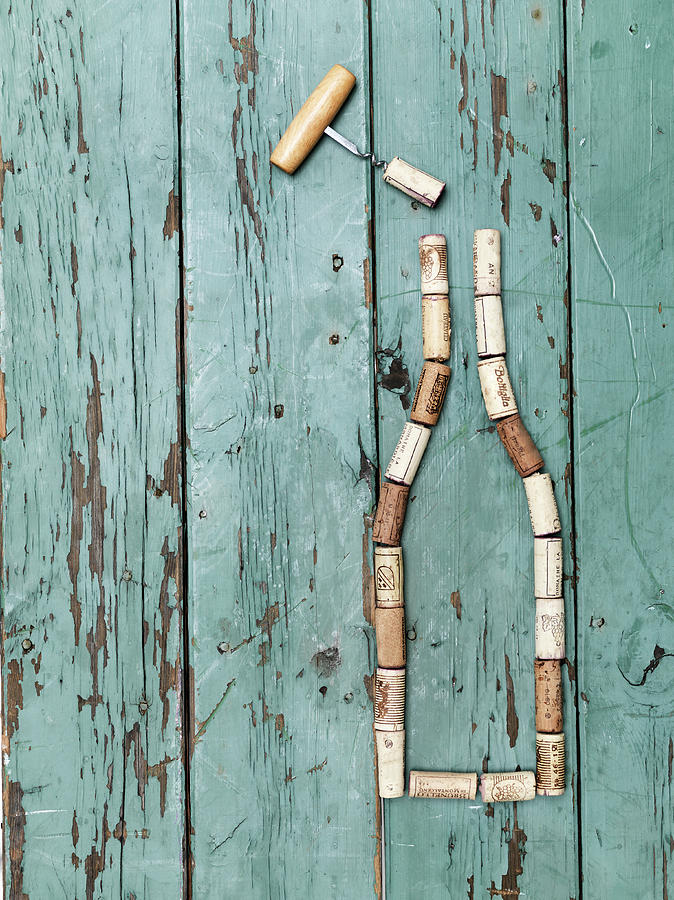 Corks With Corkscrew Photograph by Henrik Sorensen