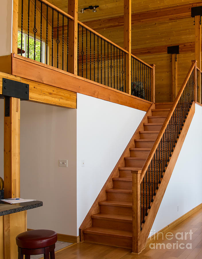 Cottage interior with wooden staircase leading to the loft Photograph by Les Palenik