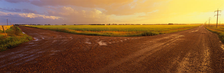 Sunset Photograph - Country Crossroads Passing by Panoramic Images