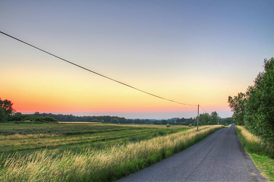 Country Road And Farms At Evening Photograph by Matt Champlin