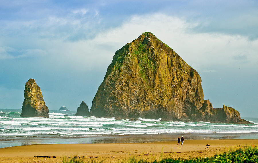Couple At Cannon Beach Photograph by Steve Bly