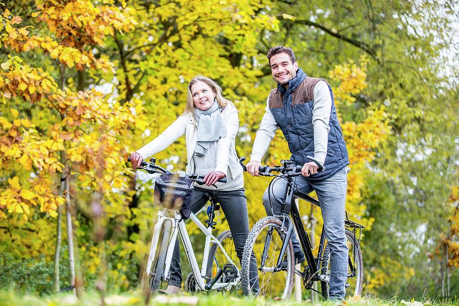 Couple Cycling Together Photograph by Science Photo Library - Fine Art ...