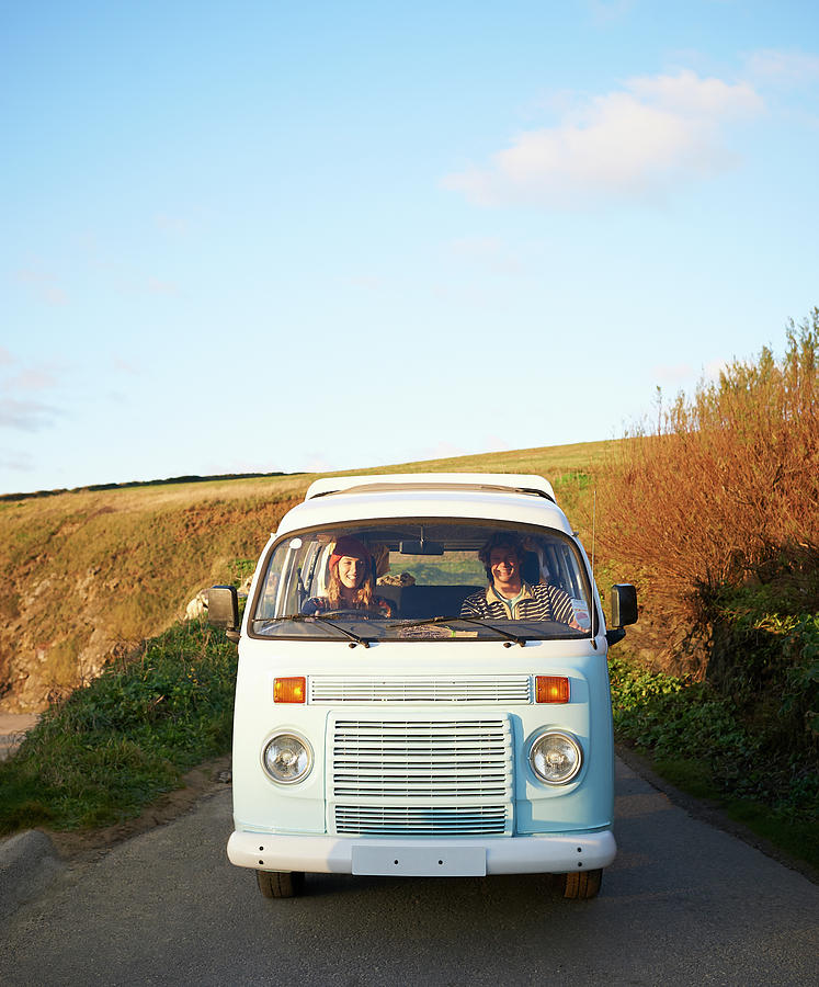 Couple Driving Camper Van Along Coastal Photograph by Dougal Waters