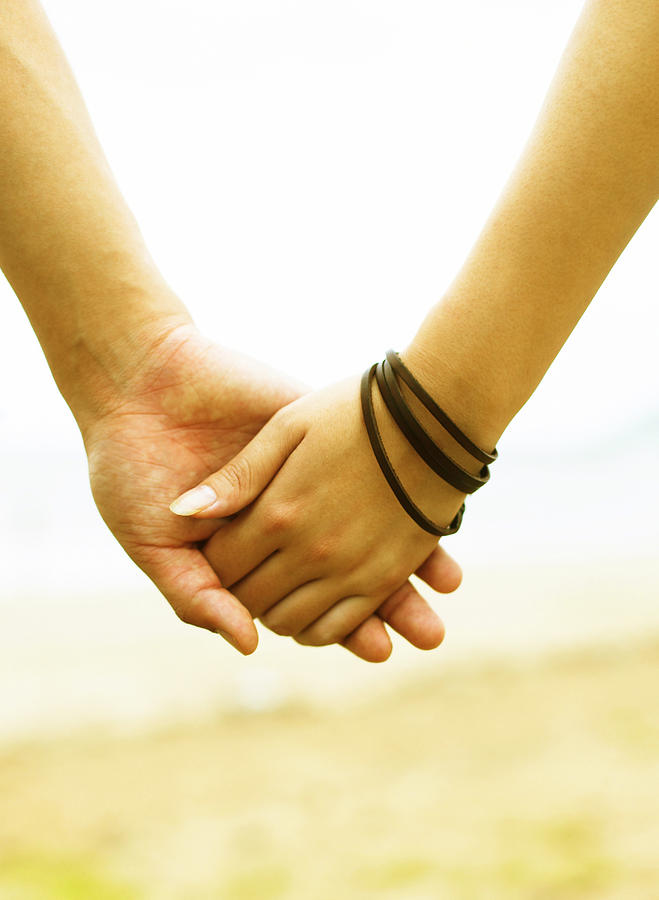 Couple Holding Hand Photograph by BLOOM image