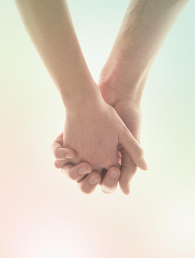 Couple holding hands Photograph by PM Images