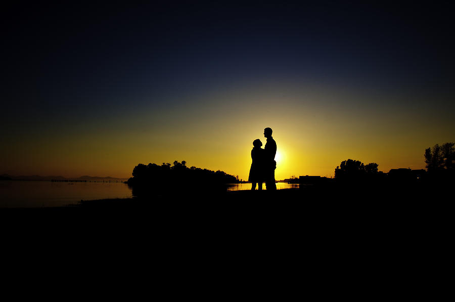 Couple In Sunset By The Shore Photograph