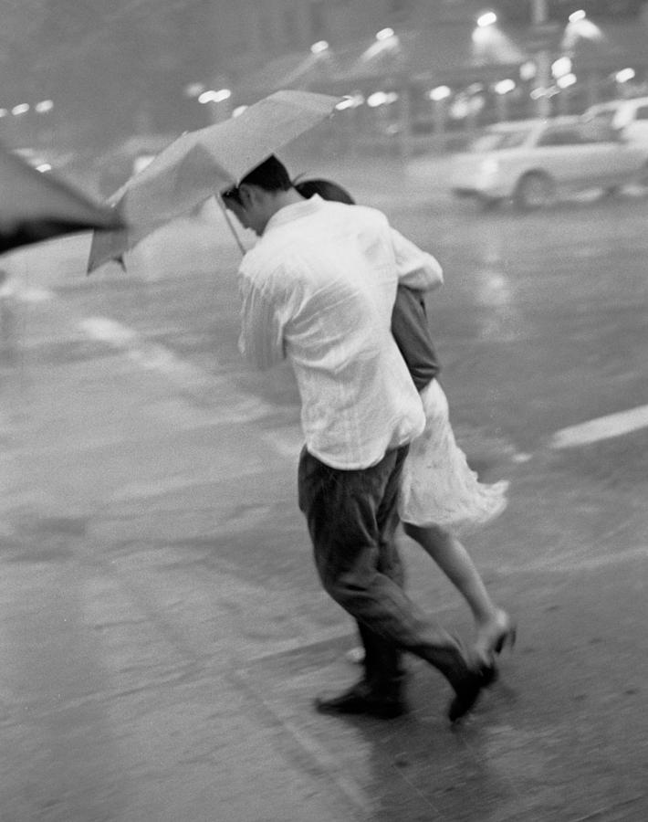 Couple In The Rain Photograph