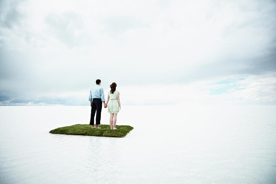 Couple On Small Island In Large Body Of Photograph by Thomas Barwick