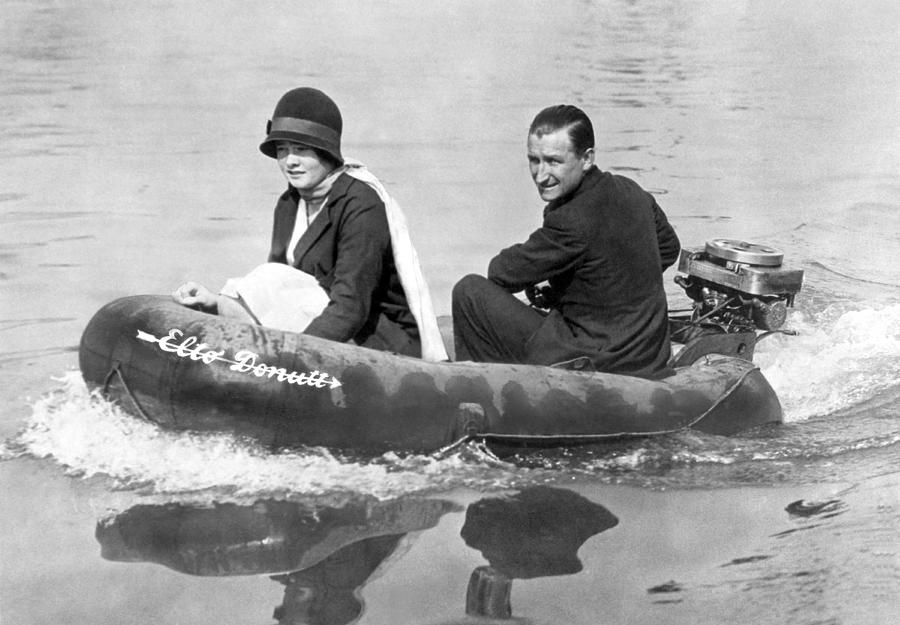 Black And White Photograph - Couple Out In A Rubber Raft by Underwood Archives