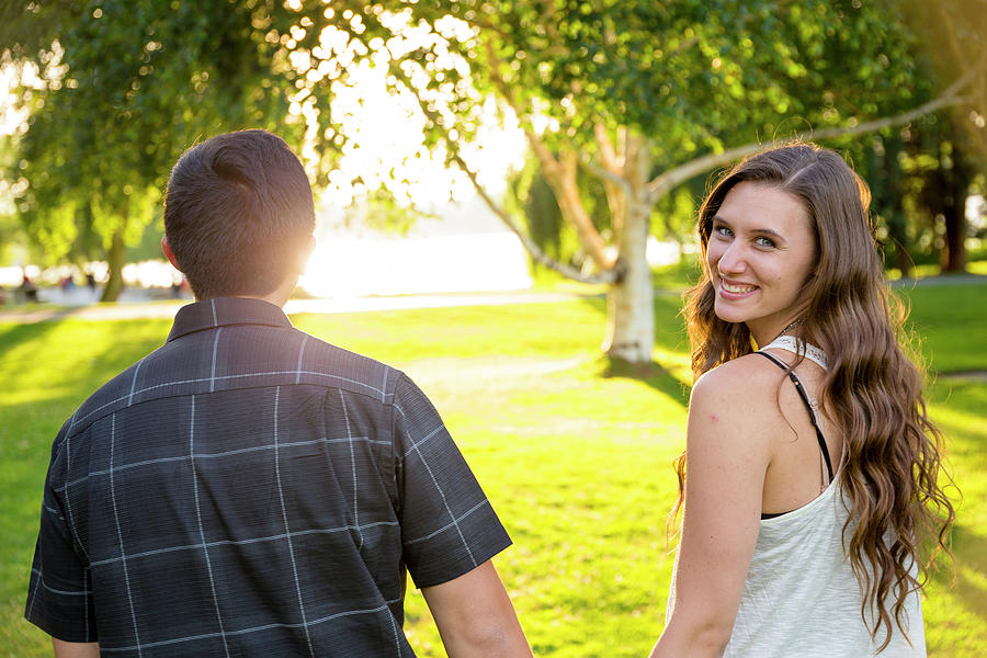 Couple Walking Holding Hands And Woman Photograph by Joshua Rainey ...