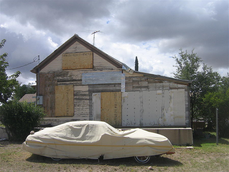 Covered car boarded up house Tombstone Arizona 2004 Photograph by David Lee Guss