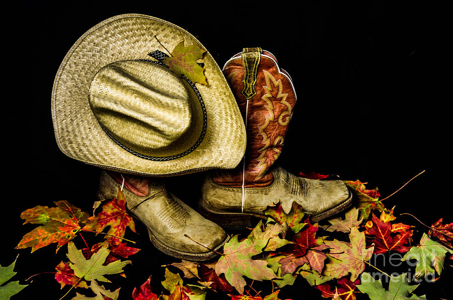 Cow boots and hat Photograph by Gerald Kloss