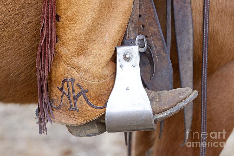 Cowboy Boot In Stirrup Photograph by M. Watson