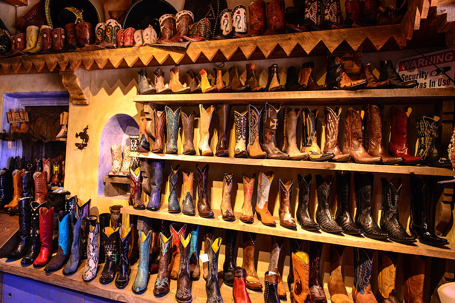 Cowboy boots Photograph by John Johnson