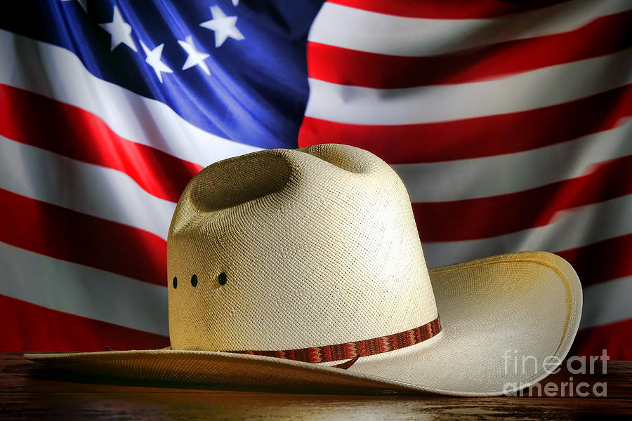 Cowboy Hat and American Flag Photograph by Olivier Le Queinec