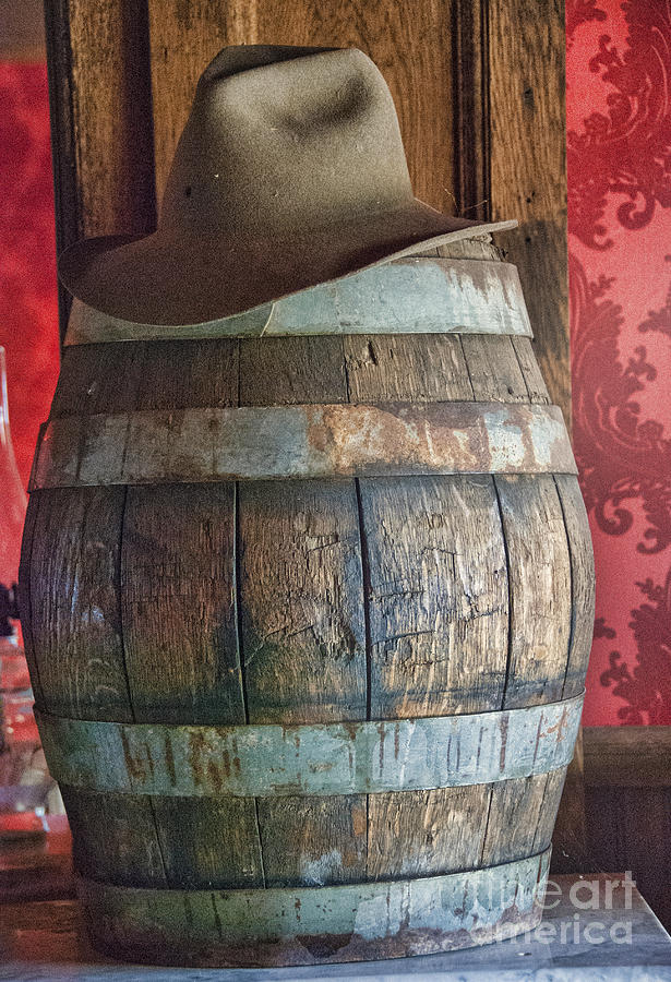 Cowboy Hat on Old Wooden Keg Photograph by Juli Scalzi