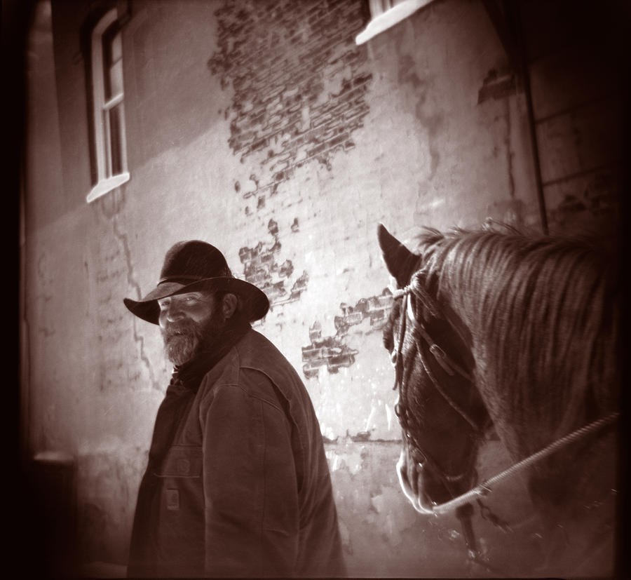 Cowboy in Town 01 Photograph by Matthew Lit