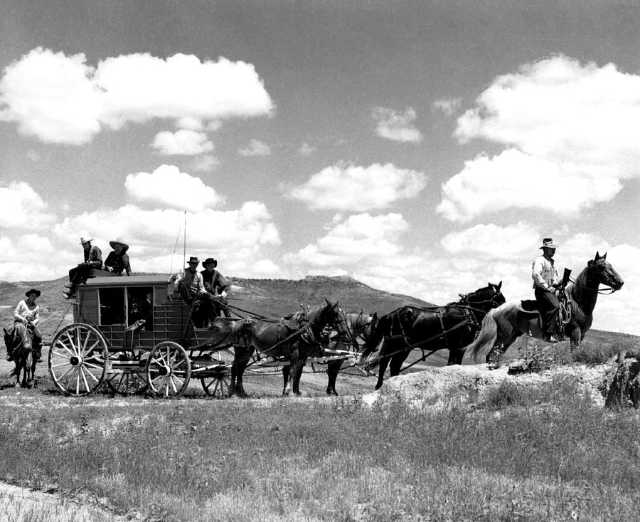 Vintage Photograph - Cowboy Wagon Ride by Retro Images Archive