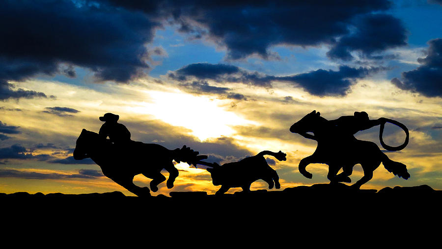 Cowboys at Sunset Photograph by Joe Myeress