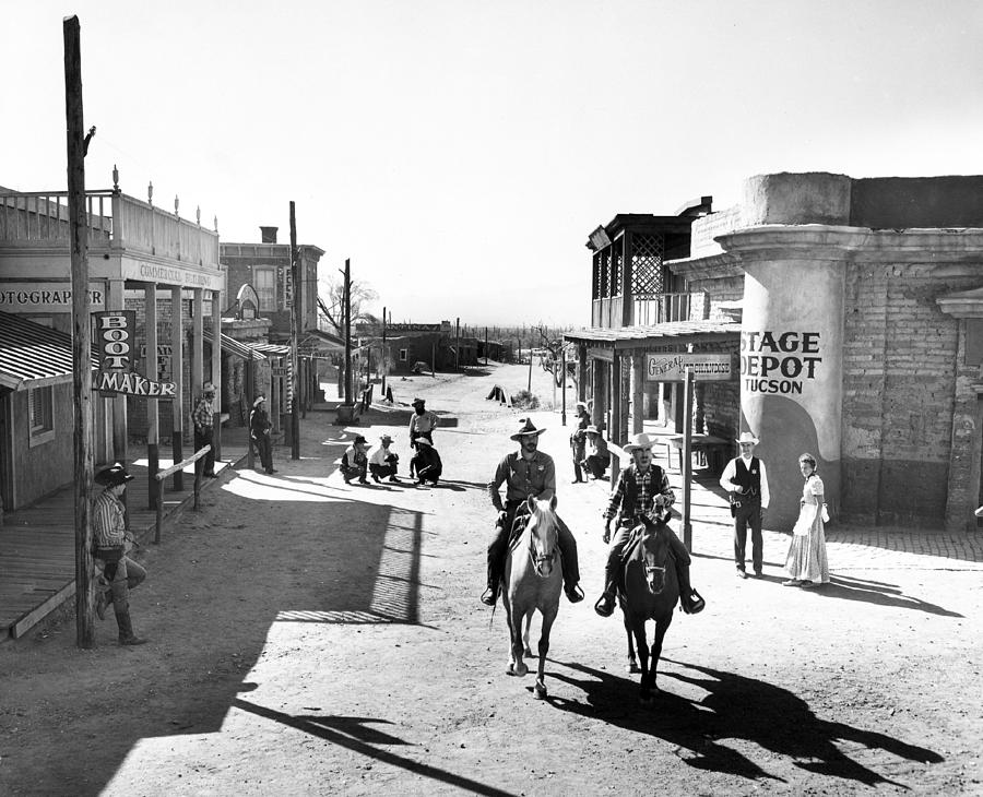 Vintage Photograph - Cowboys Come Into Town by Retro Images Archive