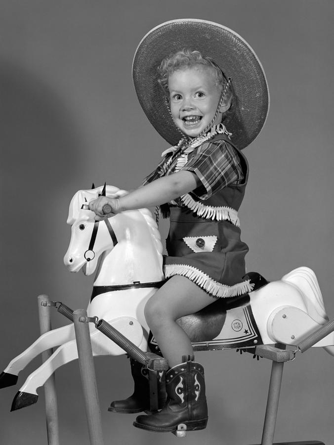 Cowgirl On Rocking Horse, C.1950s Photograph by B. Taylor/ClassicStock
