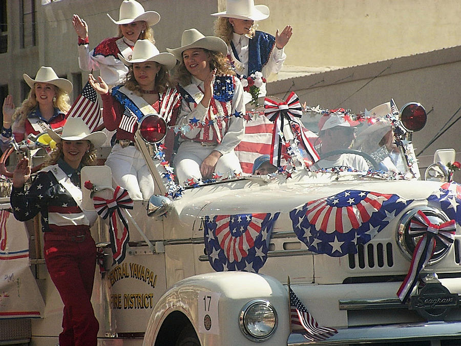 Cowgirls waving fire truck parade Prescott Arizona July 4th 2002 Photograph by David Lee Guss
