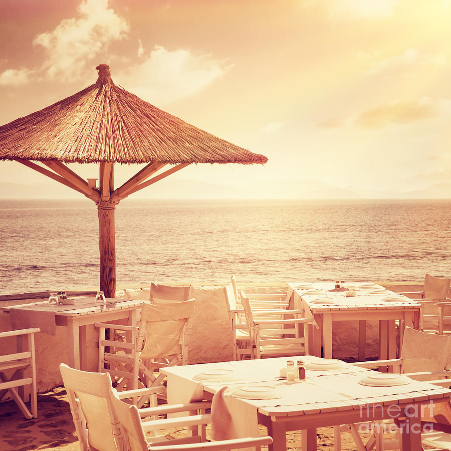 Cozy restaurant on the beach Photograph by Anna Om