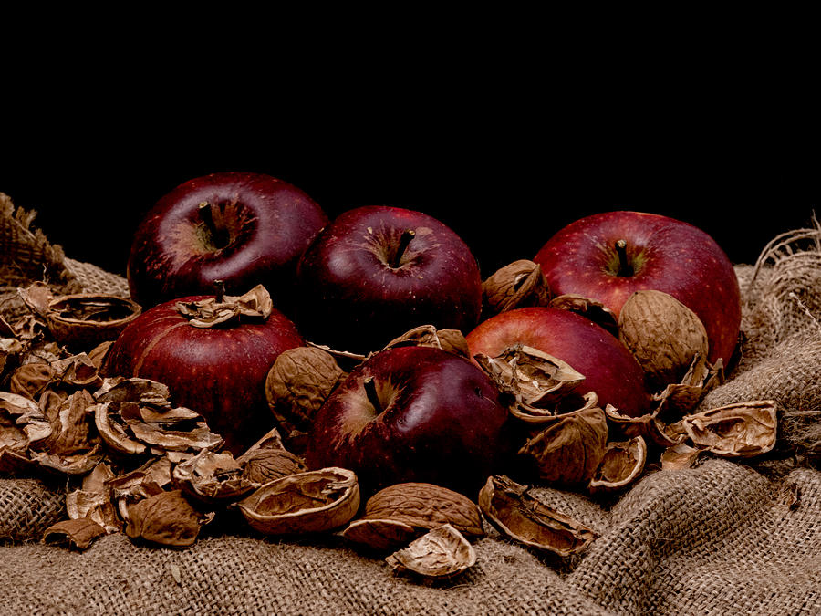Apple Photograph - Apples and nutshells by Mike Santis