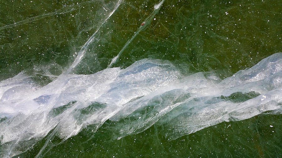 Crack in Lake Ice Photograph by Lynn Hansen
